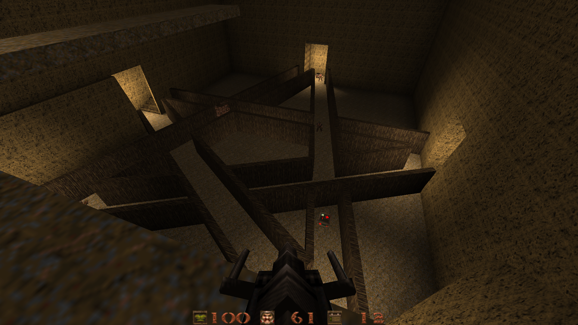 A screenchot of a Quake level. The player overlooks a maze in the shape of a pentagram.